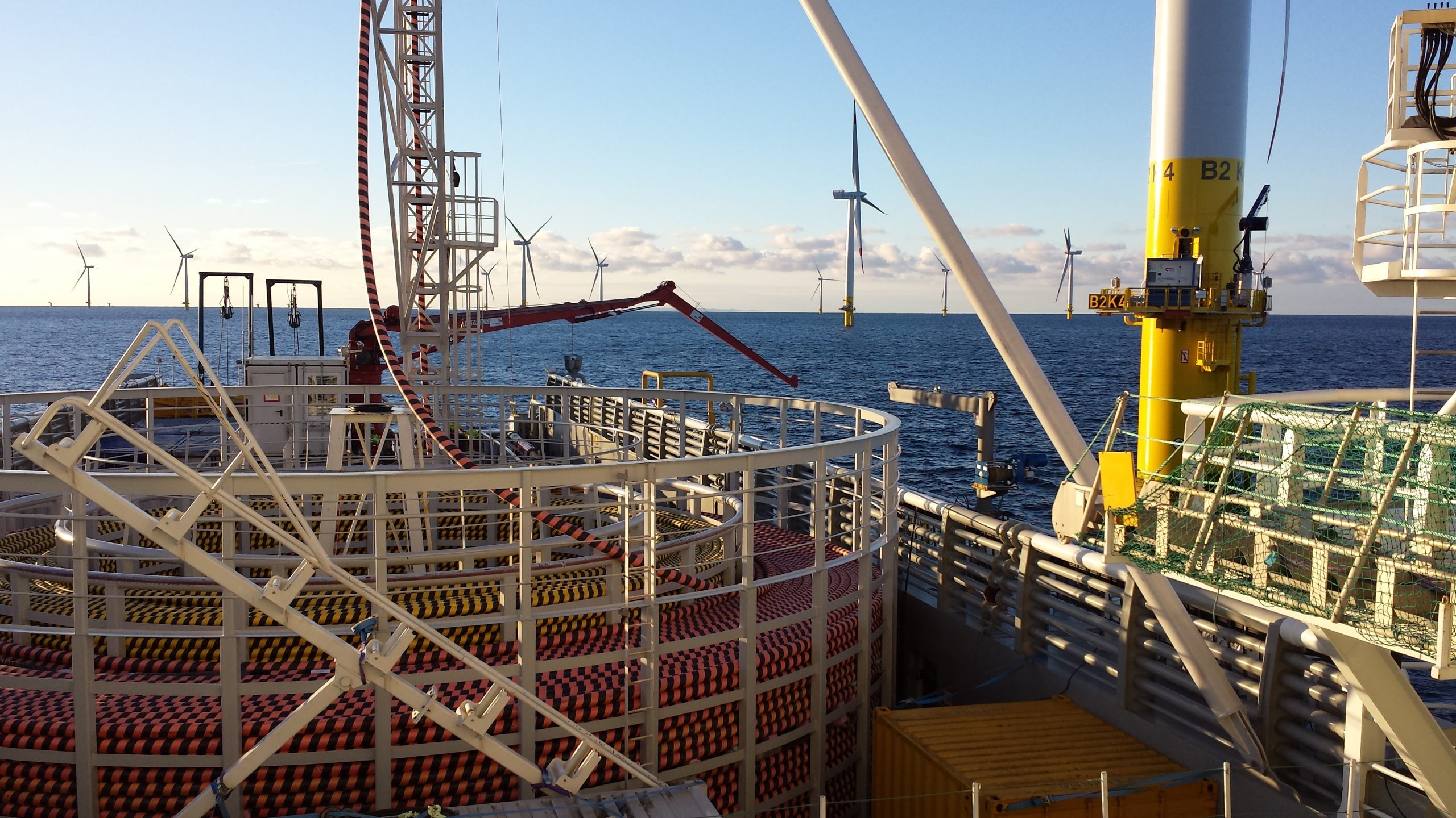 Cable-laying,Vessel,Lays,Cable,At,Sea,In,A,Wind,Farm